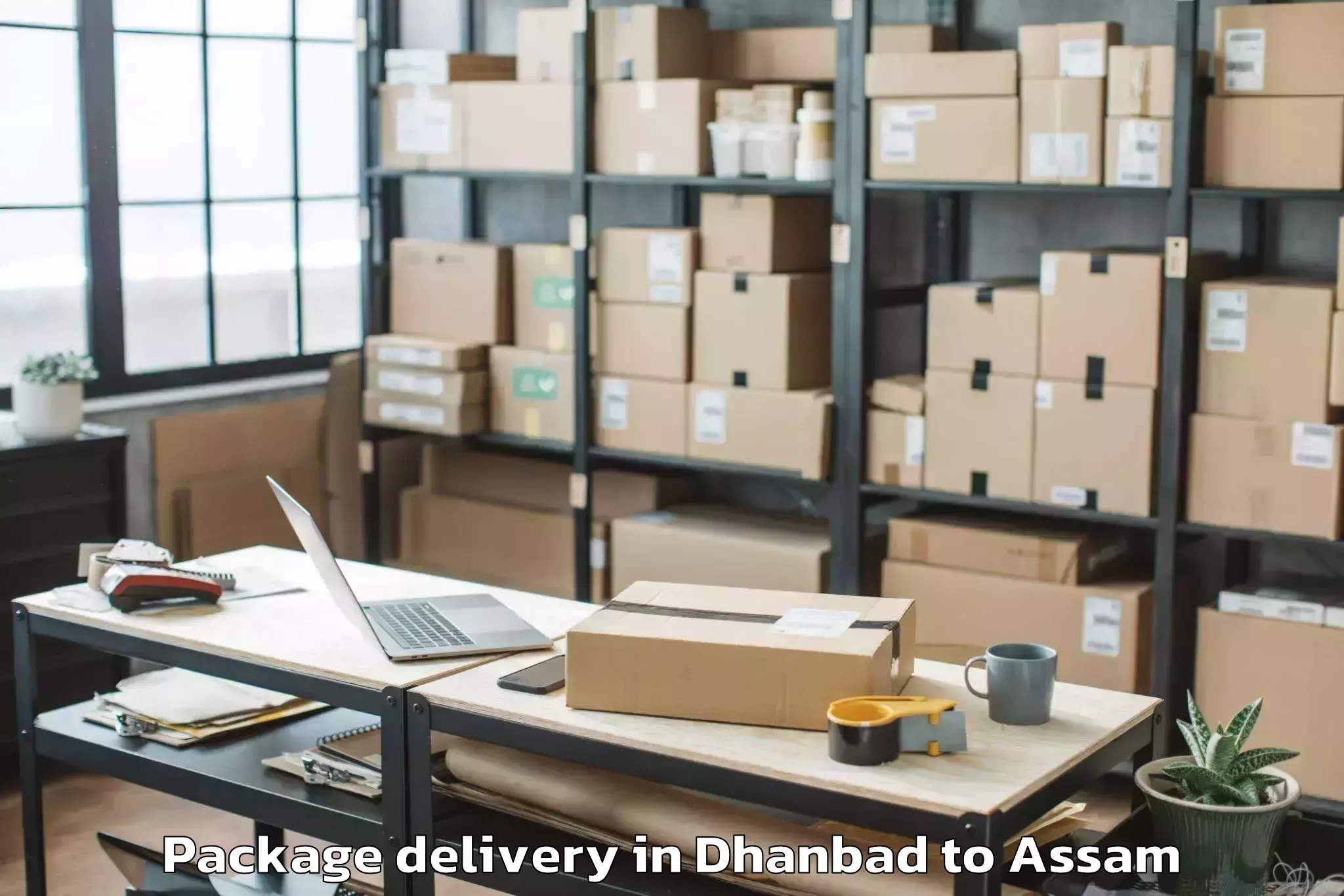 Easy Dhanbad to Laharighat Package Delivery Booking